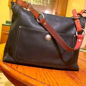 Medium black leather coach purse.